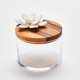 LOTUS M | Boîte transparente en verre et bois ornée d"une fleur en porcelaine